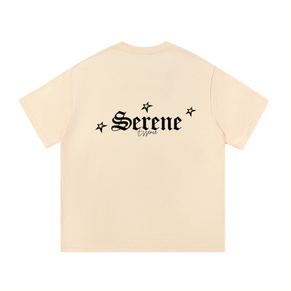 ODMPOD F3THY Serene Washed Oversized Tee in apricot, pink, and blue, showing a relaxed fit and soft washed fabric.