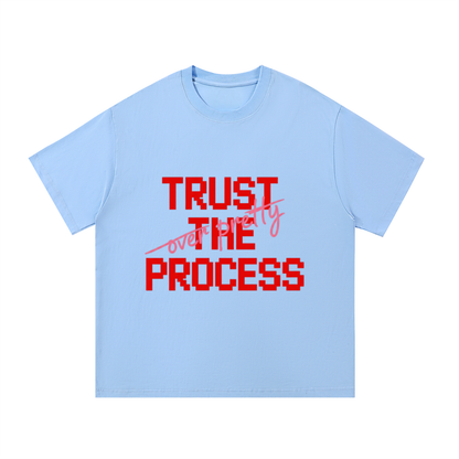ODMPOD F3THY "Trust the Process" quote print in black, white, and apricot featuring front and back designs on paper.