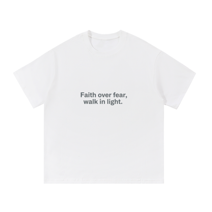 Black F3THY risen. T-shirt by ODMPOD featuring bold graphic design and comfortable fit, shown on a plain background.