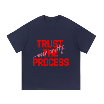 ODMPOD F3THY “Trust The Process” quote print in black, white, and apricot with front and back designs on paper.